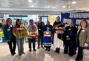 Grupo de personas de pueblos originarios y personal de salud en la Feria Intercultural del Hospital Fricke.