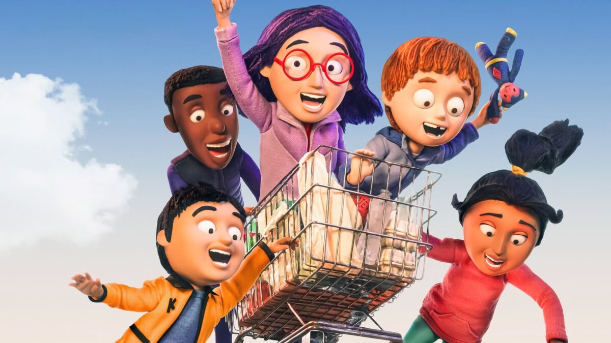 Personajes de la película animada Olivia y el terremoto invisible celebrando en un carro de compras.