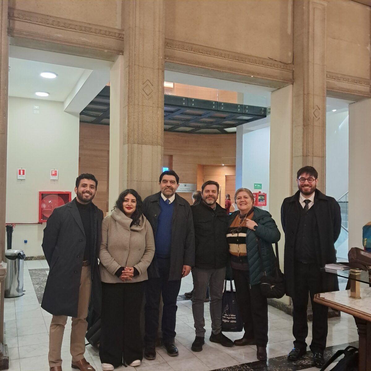 Representantes de FENATRAMA tras su intervención en el Tribunal Constitucional.